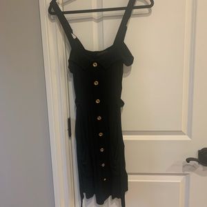 Black dress with gold buttons